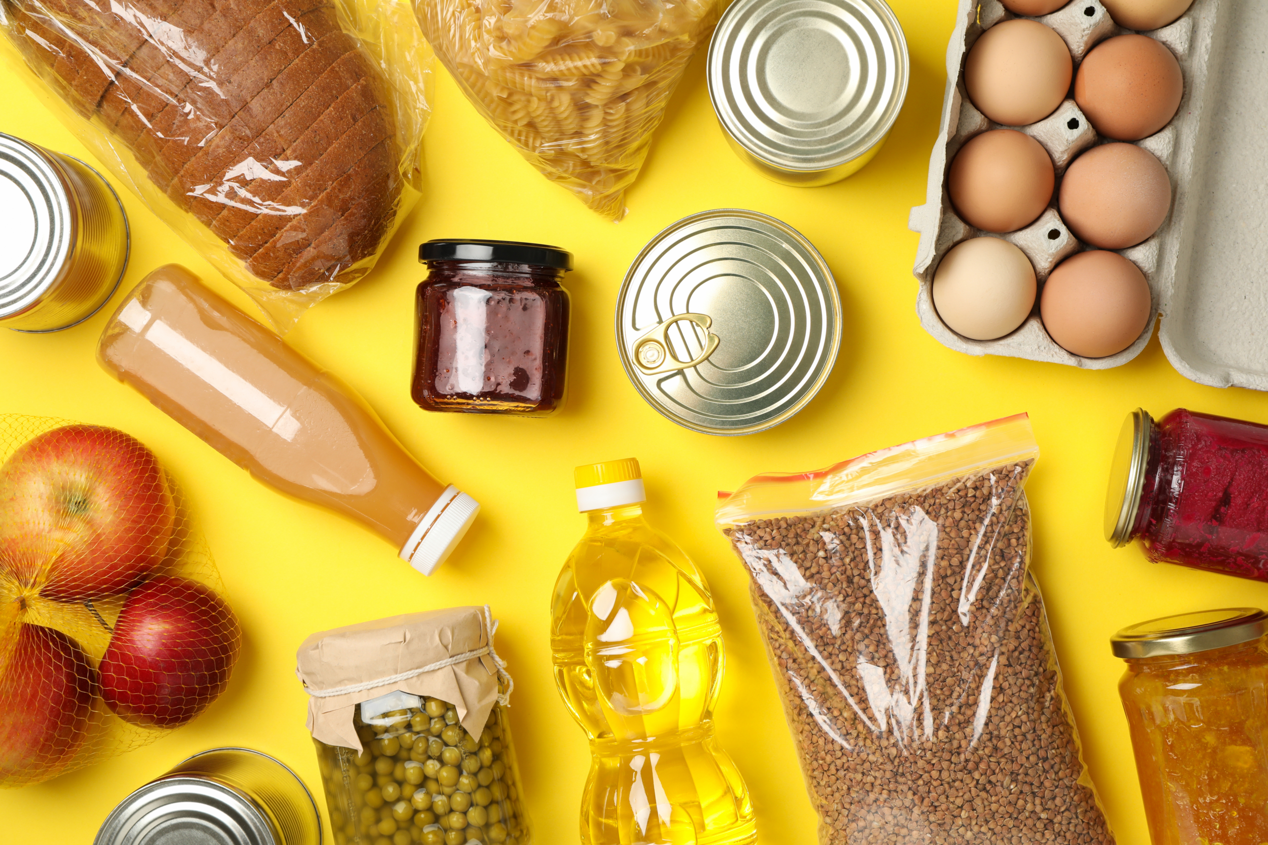 Different food on yellow background top view don 2026 01 09 07 28 43 utc