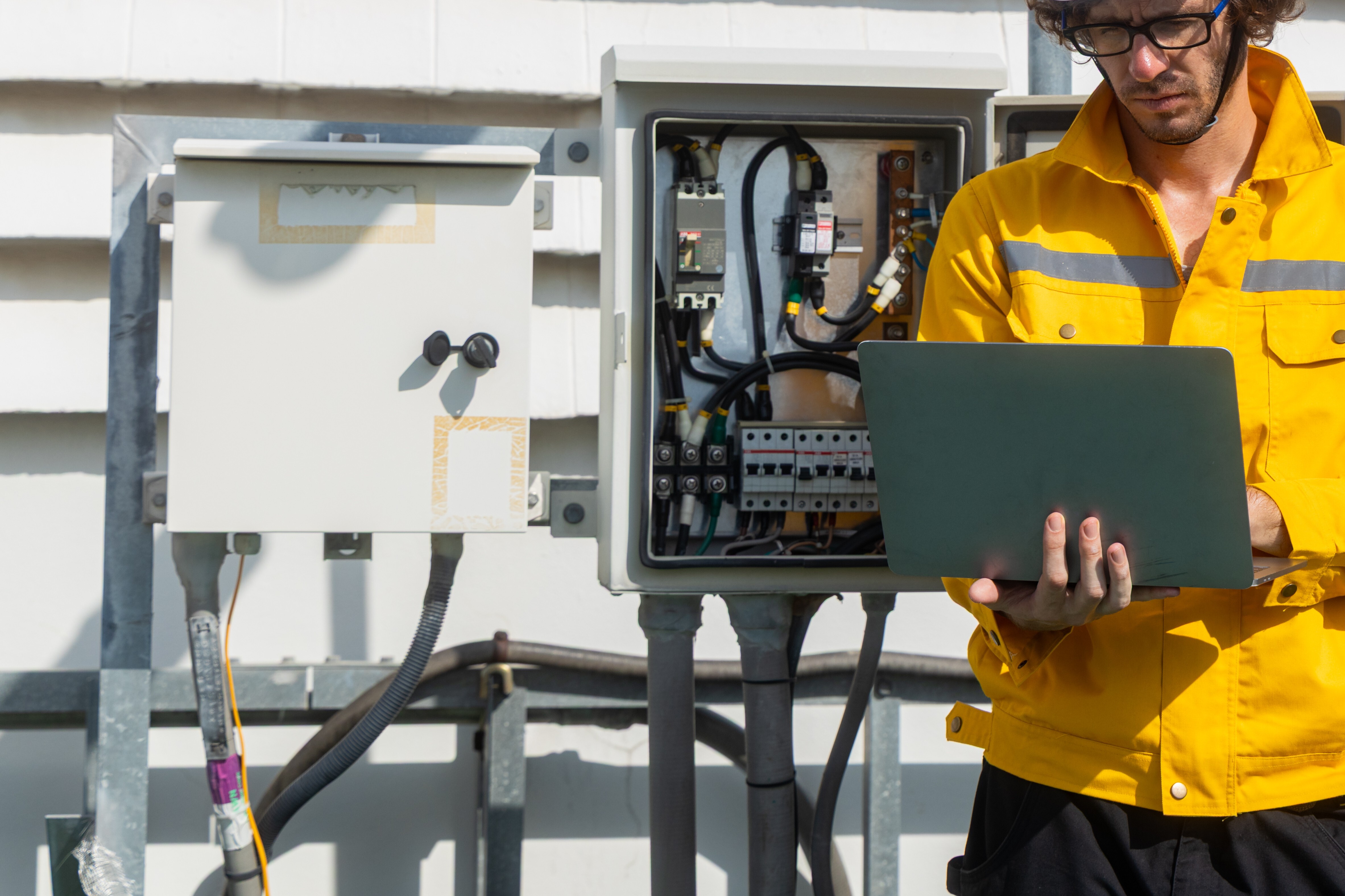 Engineers inspecting rooftop electrical equipment 2026 02 03 21 07 55 utc